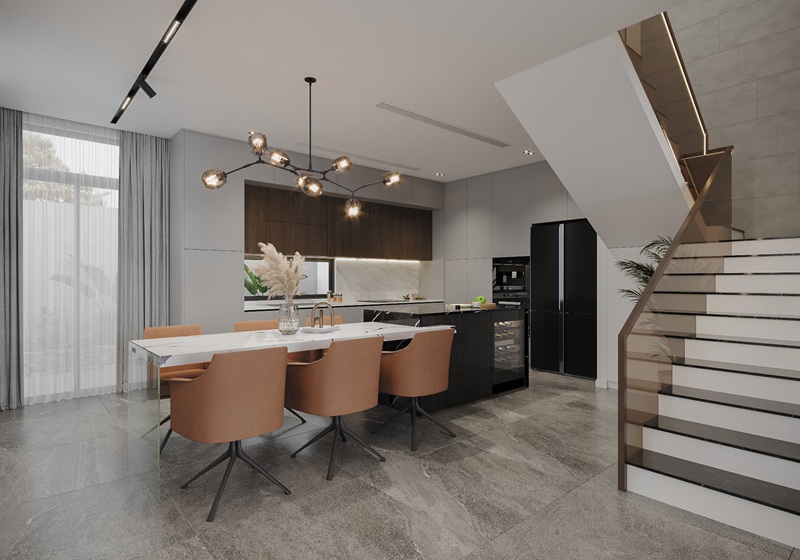 Không gian phòng bếp được tách biệt với phòng khách bằng hệ cầu thang hiện đại 