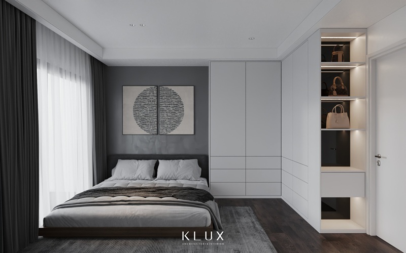 Phòng ngủ master hiện đại với bức tranh trang trí ấn tượng với hệ tủ cao kịch trần