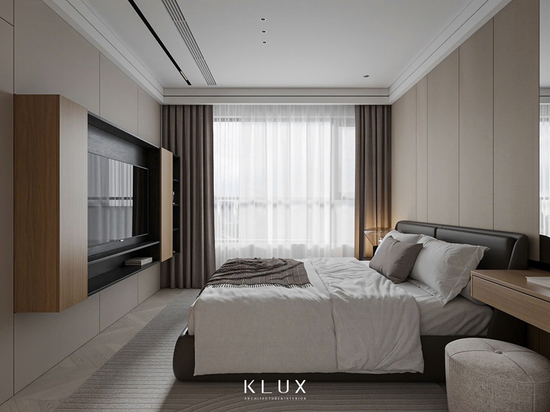 Kệ TV chạy dọc liền tường giúp tối đa hóa diện tích mặt sàn, giúp không gian phòng ngủ thoáng đãng hơn